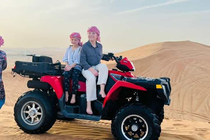 Dubai Evening Desert Safari with Quad Bike, Camel Ride and BBQ