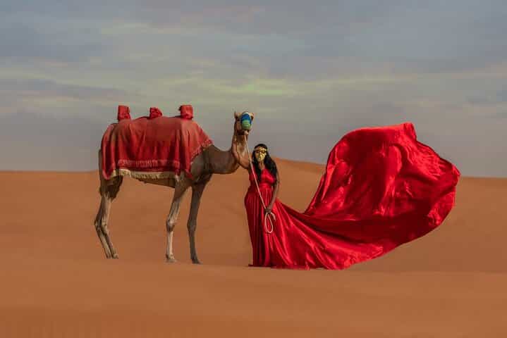 Flying Dress Photography in Desert Dunes of Dubai With Transfers