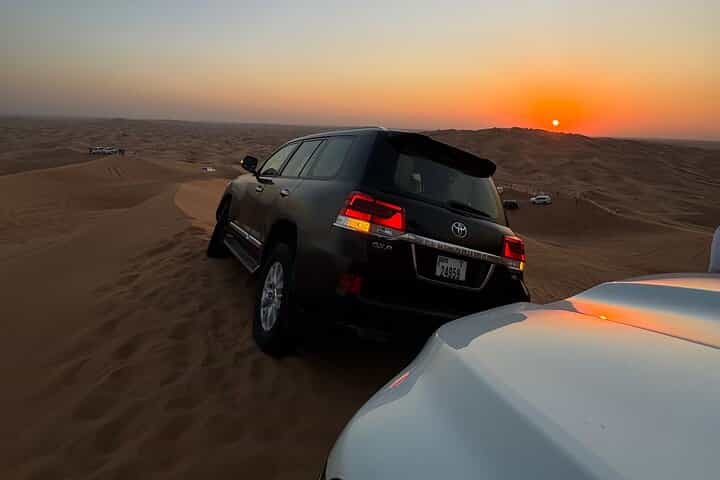 Dubai: VIP Sunset Red Dune Safari, Camel Ride & BBQ Dinner
