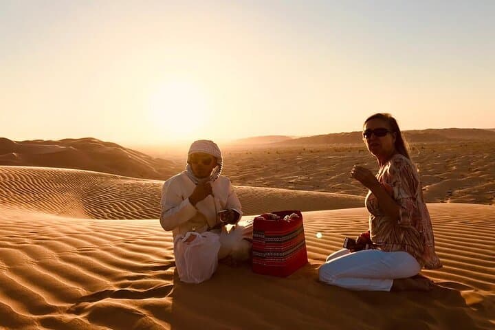 Rub Al Khali Desert Safari: Sunset, Sandboarding & Black Camels
