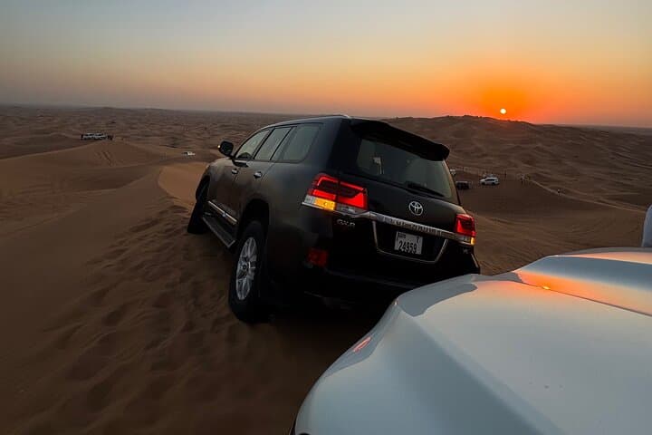 Dubai: VIP Sunset Red Dune Safari, Camel Ride & BBQ Dinner