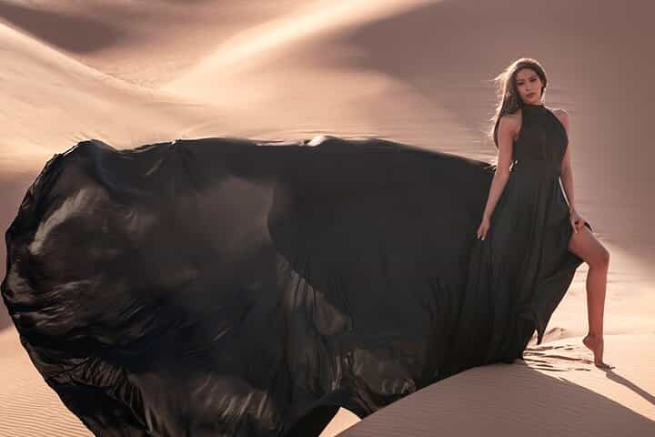 Flying Dress Photography in Desert Dunes of Dubai With Transfers