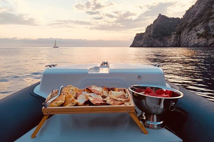 סיור סירות בשקיעה עם אפריטיף בפורטופינו